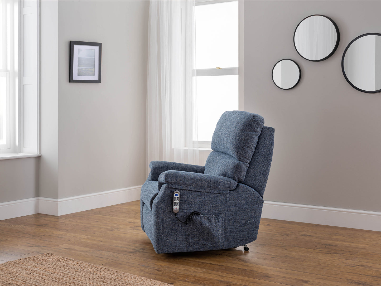 Celebrity Newstead Electric Powered Recliner Fabric Armchair With Adjustable Headrest & Lumbar Option