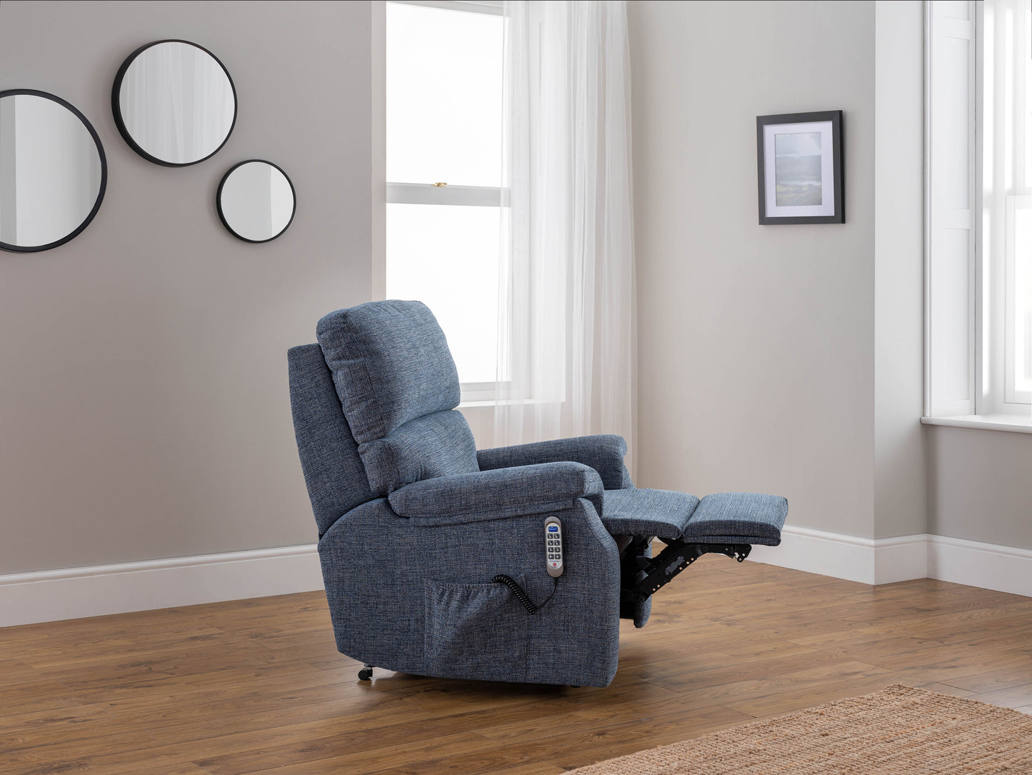 Celebrity Newstead Electric Powered Recliner Fabric Armchair With Adjustable Headrest & Lumbar Option